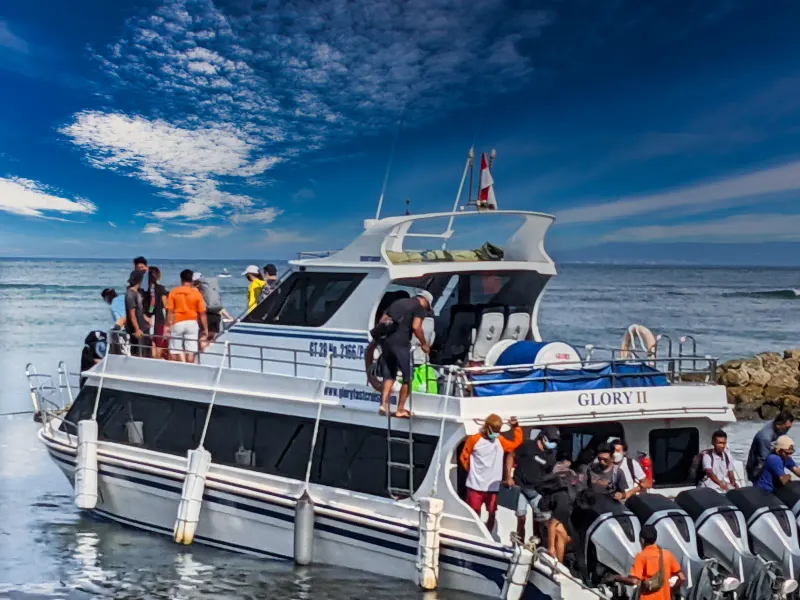 Glory boat is leaving the harbor toward Nusa Lembongan